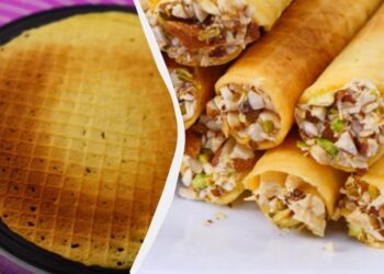 Хрусткі вафельні трубочки зі згущеним молоком, вершками та горішками: рецепт (відео)