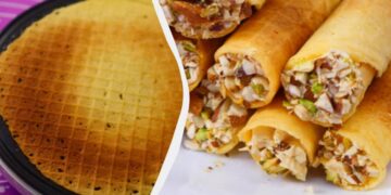 Хрусткі вафельні трубочки зі згущеним молоком, вершками та горішками: рецепт (відео)